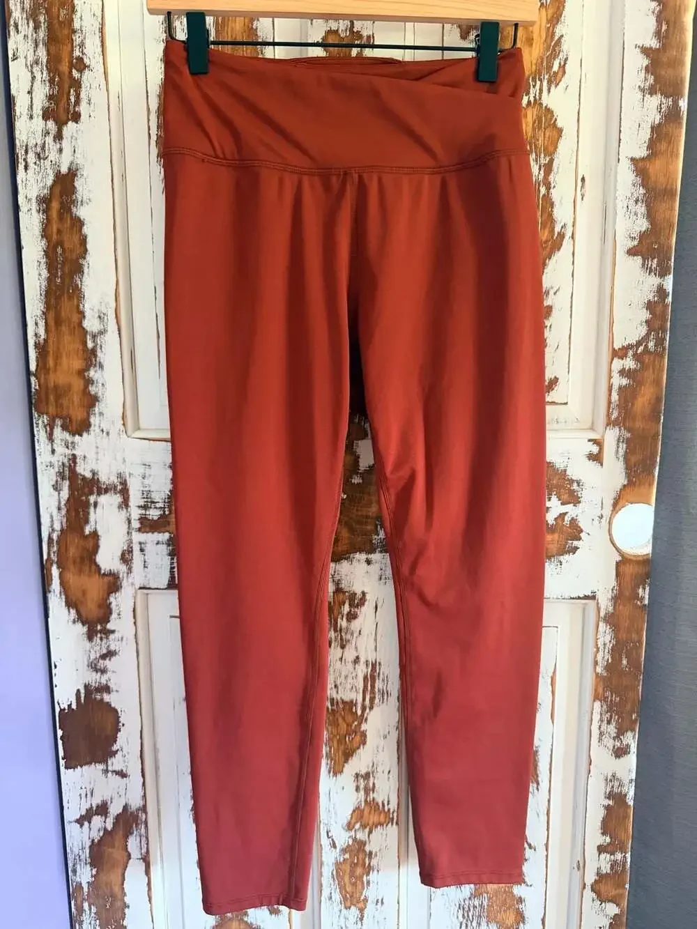 Free People Movement High Rise Cross-Waist Leggings in Burnt Orange